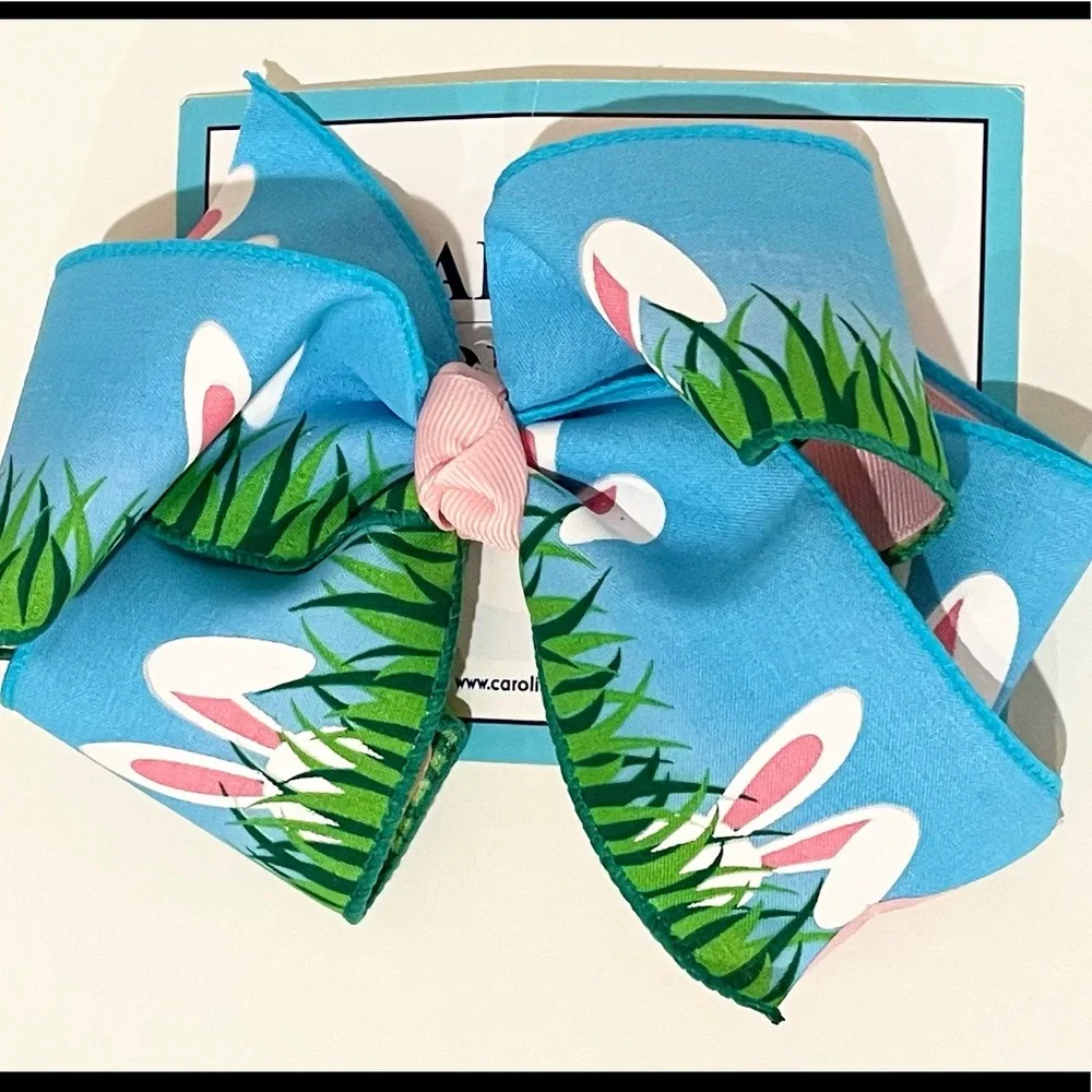 Large, colorful, double hair bow with bunny ears